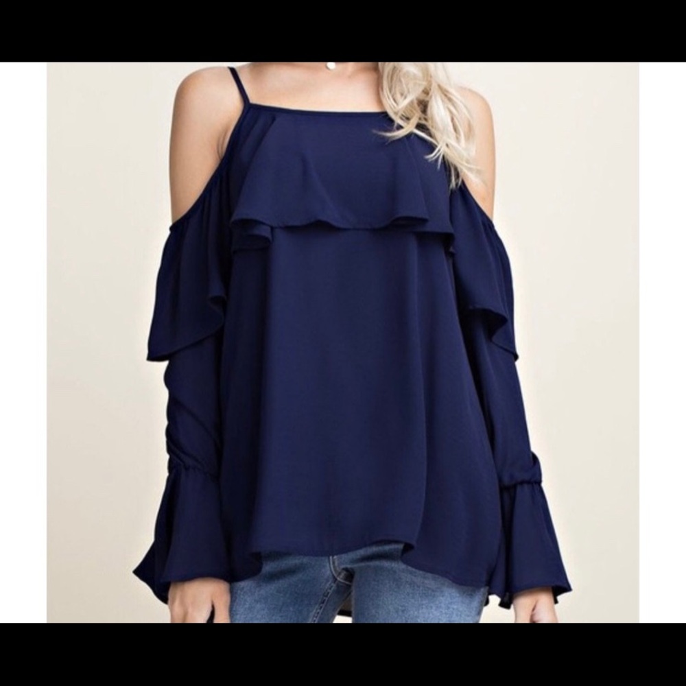 Brand new beautiful blue flowey shirt.